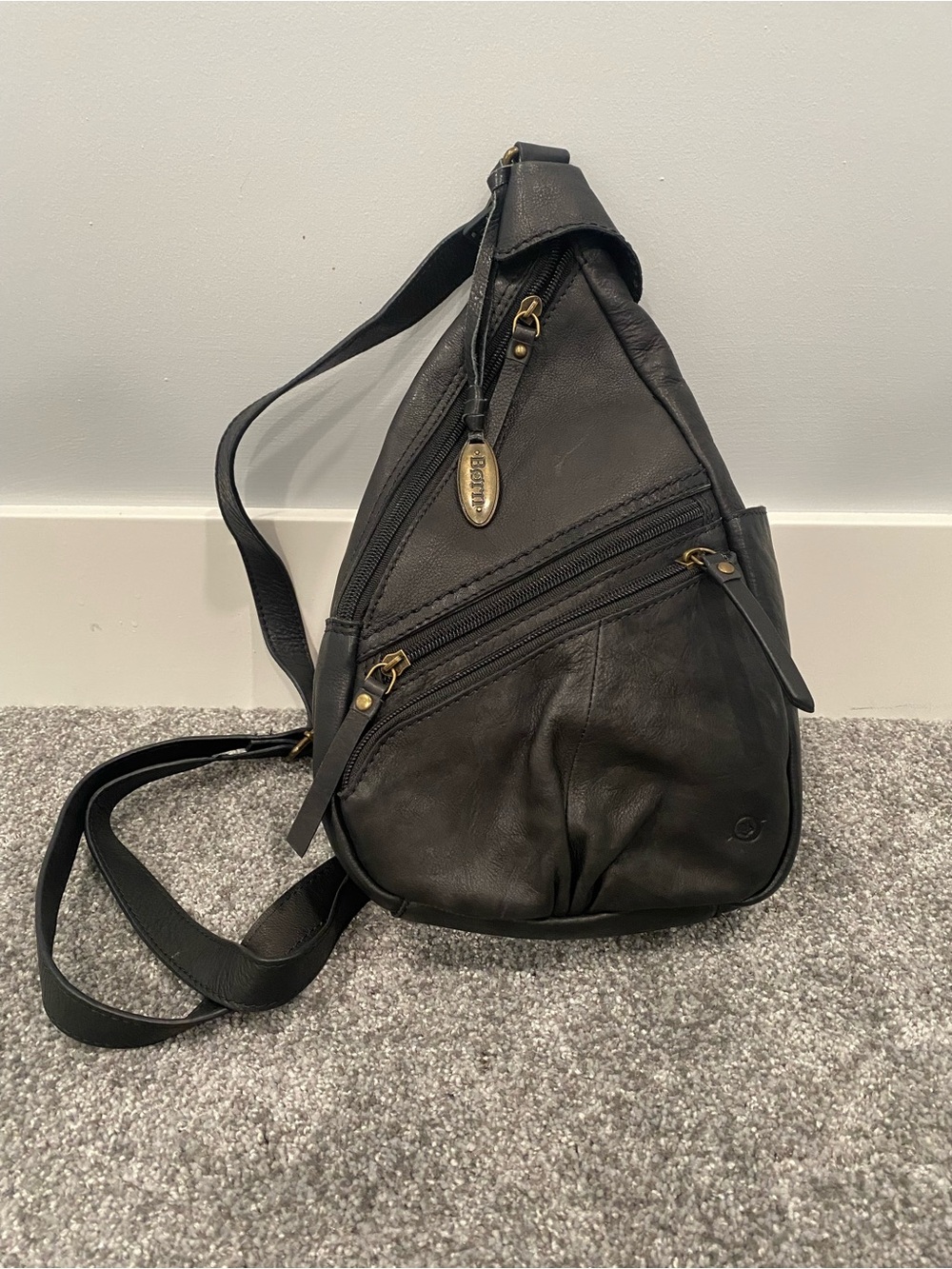 Born Multi Compartment Soft Leather Sling Bag In Black With Brass Hardware